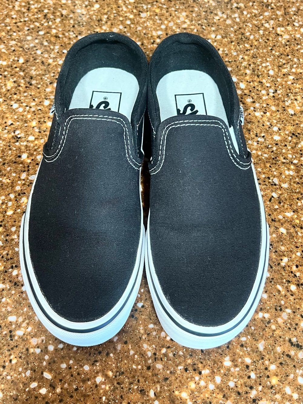 Vans Black Canvas Slip-On Shoes with White Sole